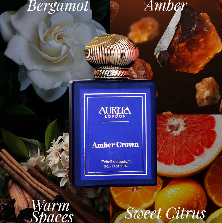 Aurelia London Amber Crown perfume bottle surrounded by flowers, amber, citrus fruits, and cinnamon sticks.