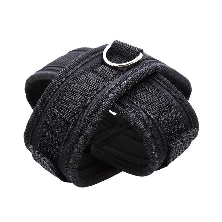 Black wrist wrap with a metal buckle on a white background