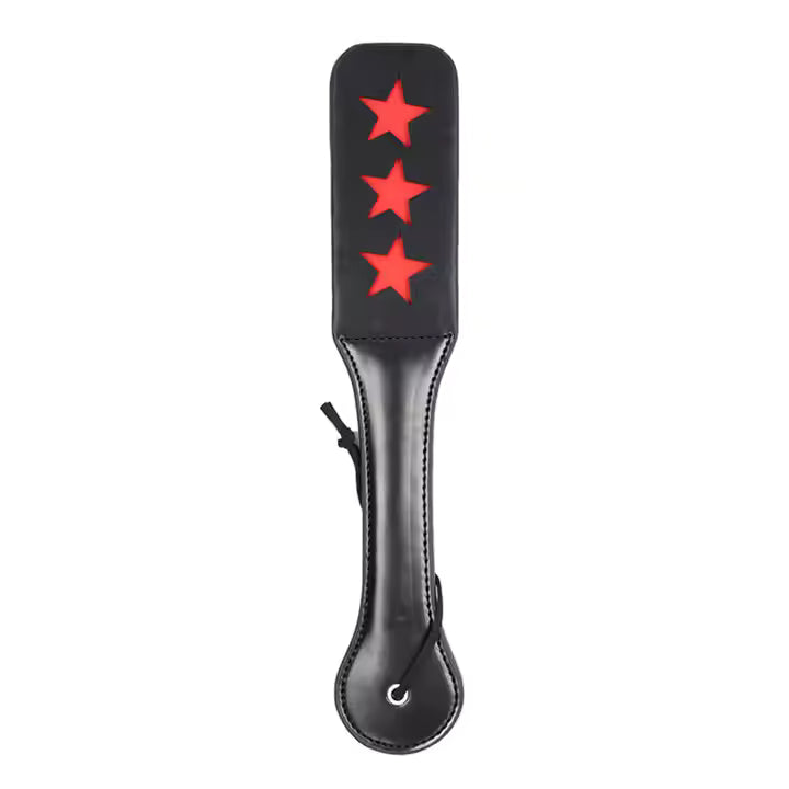 Black paddle with red stars on a white background