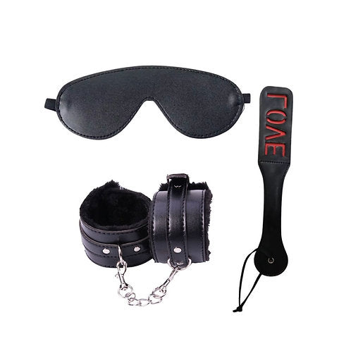 Black eye mask, handcuffs, and paddle with 'LOVE' branding on a white background