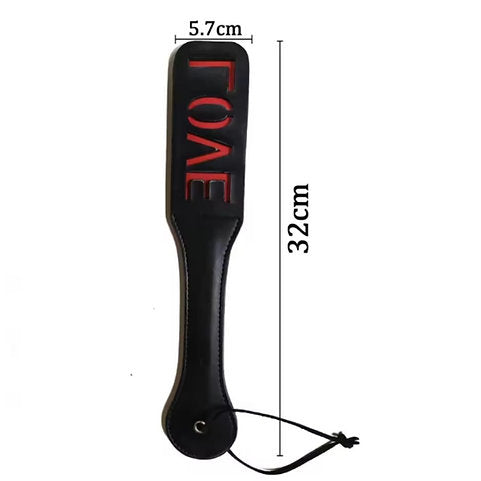 Black paddle with 'LOVE' text and measurements on a white background