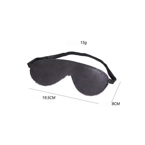 Black sleep mask with measurements on a white background