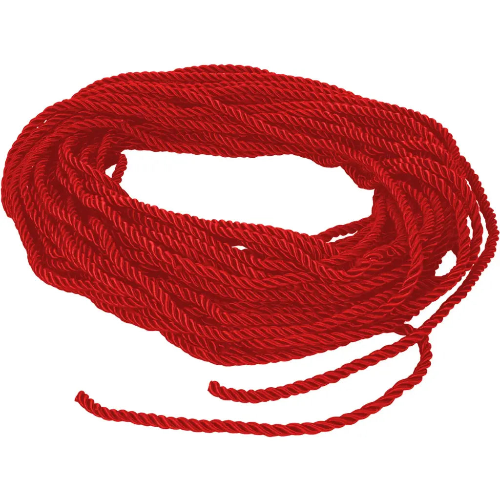 Coiled red rope on a white background