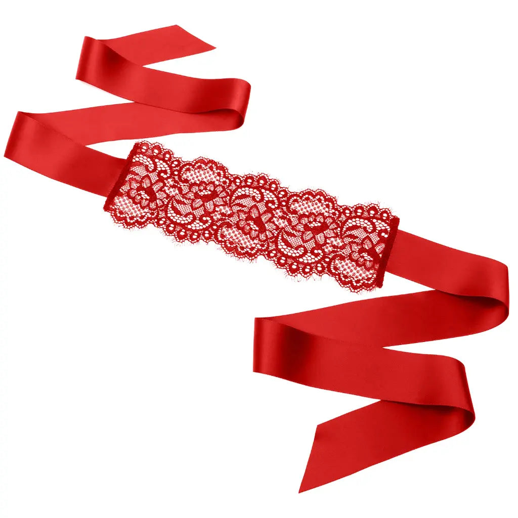 Red lace sash with ribbons on a white background