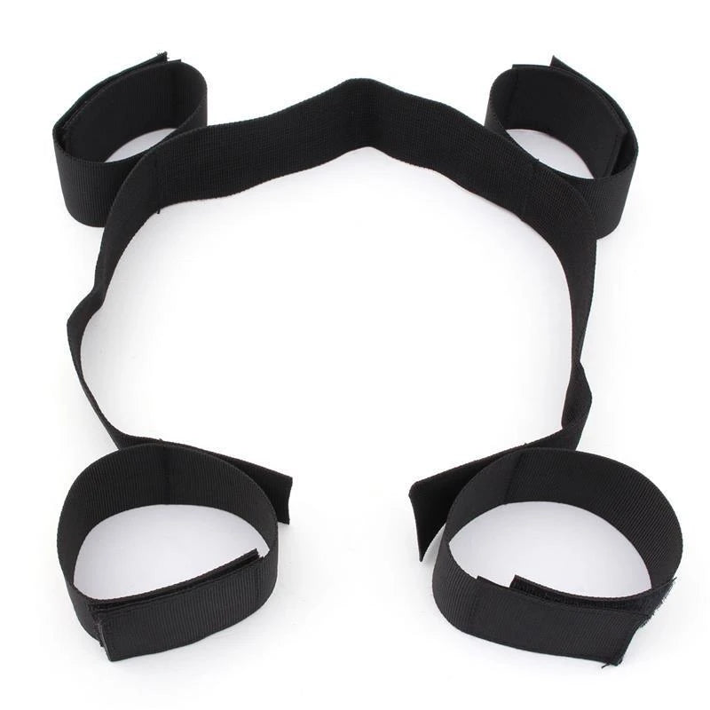 Black knee pads with straps on a white background