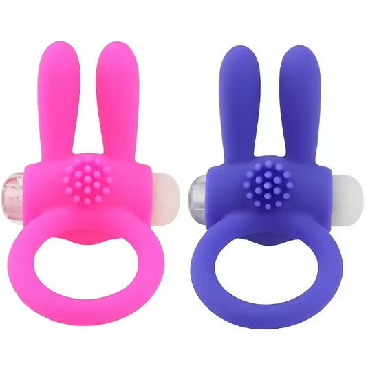 Two silicone rabbit-shaped toys, one pink and one purple, on a white background.