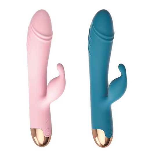 Pink and blue handheld massagers on a white background
