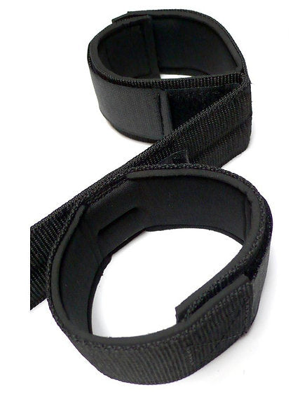 Two black wrist straps on a white background