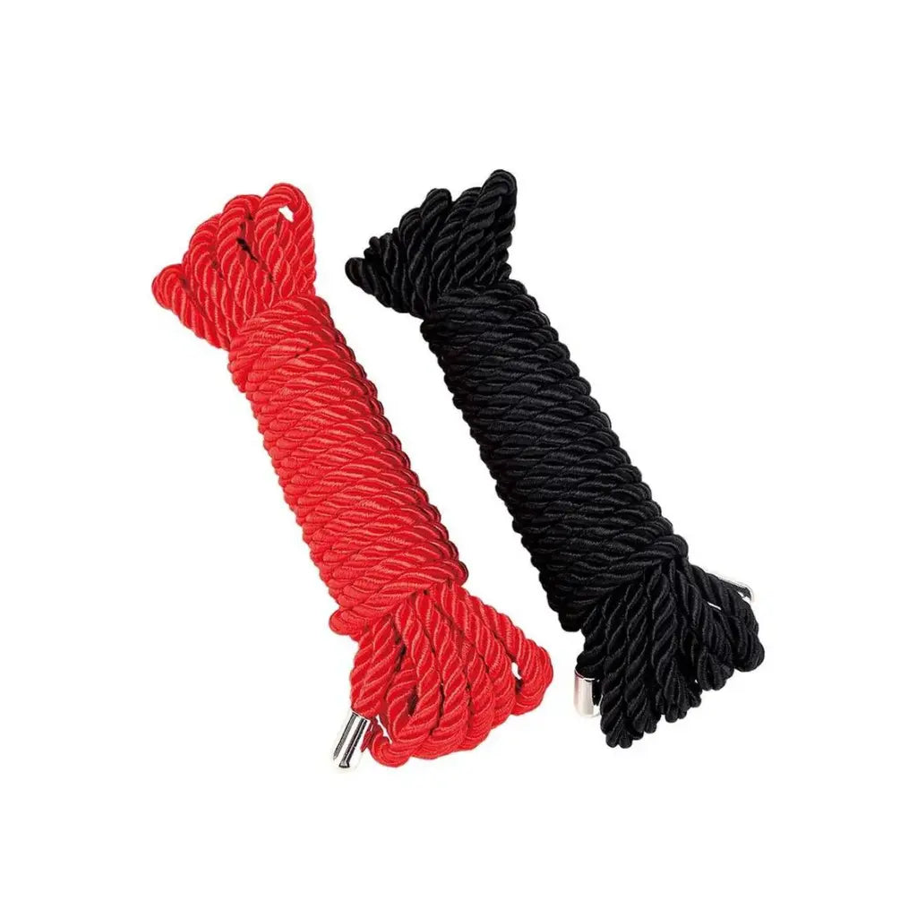 Red and black shoelaces on a white background