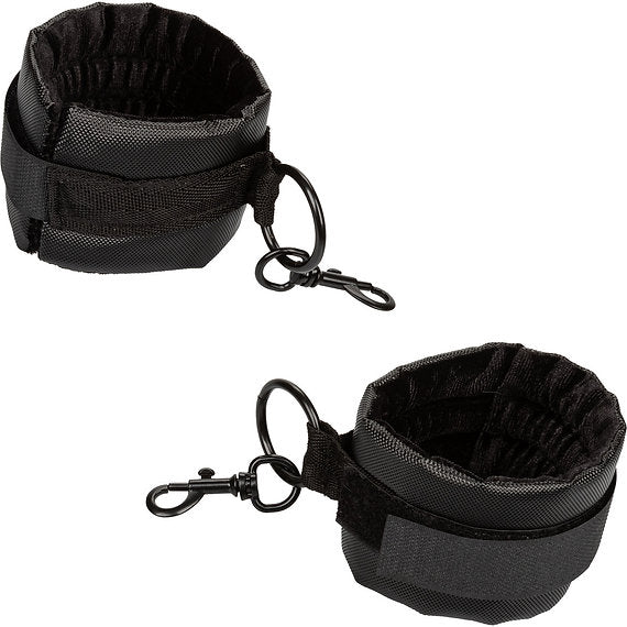 Two black pet training惩戒器 on a white background